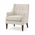 Poltrona in tessuto beige con gambe in legno