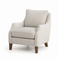 Poltrona in tessuto beige con gambe in legno