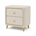 Comodino con cassetti rivestiti in tessuto beige
